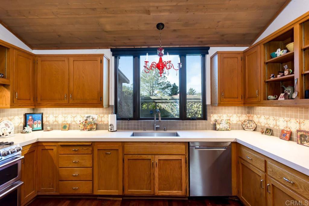 1249 Melba Road Encinitas, CA 92024 - Photo 20 of 47 a bathroom with a sink double vanity granite and a window