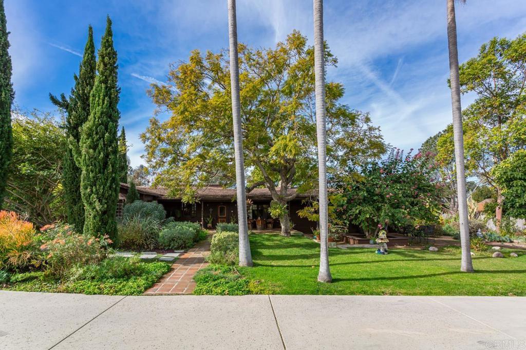 1249 Melba Road Encinitas, CA 92024 - Photo 2 of 47 a view of a park with a tree in the background
