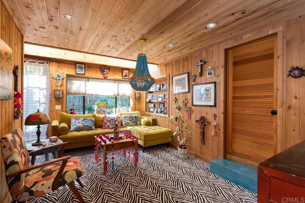 1249 Melba Road Encinitas, CA 92024 - Photo 26 of 47 a living room with furniture and a large window
