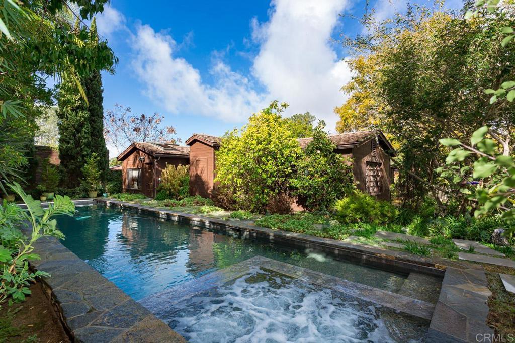 1249 Melba Road Encinitas, CA 92024 - Photo 31 of 47 a view of a lake with a house in the background