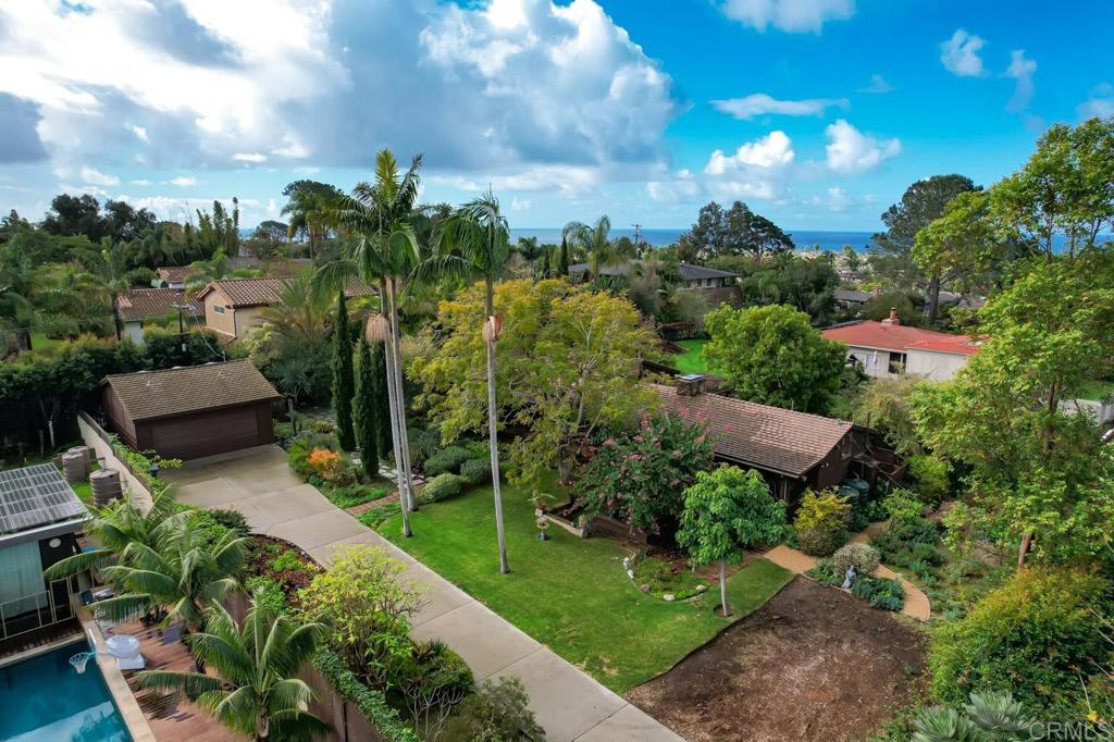 1249 Melba Road Encinitas, CA 92024 - Photo 44 of 47 a view of a garden with chairs and potted plants