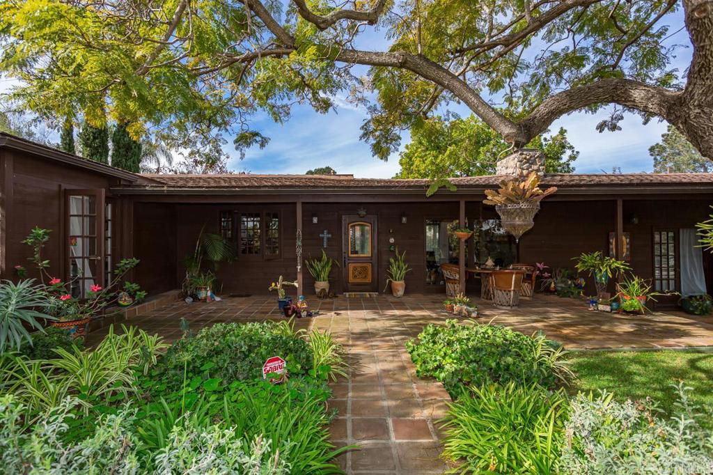 1249 Melba Road Encinitas, CA 92024 - Photo 6 of 47 a view of a house with a patio