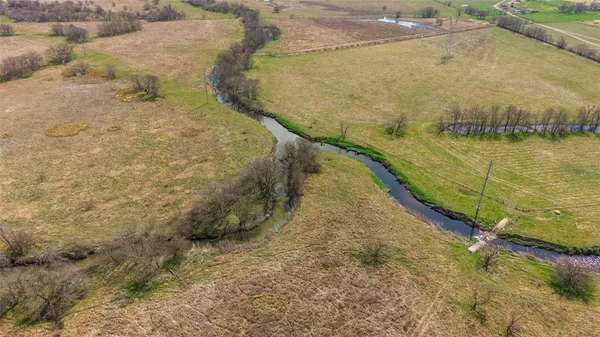 a view of a yard with an outdoor space