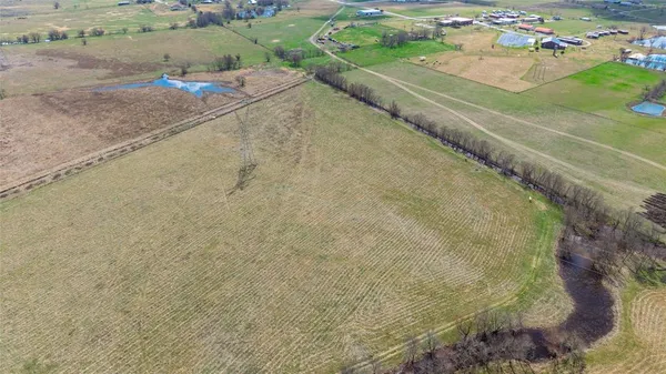 a view of a lake with a big yard