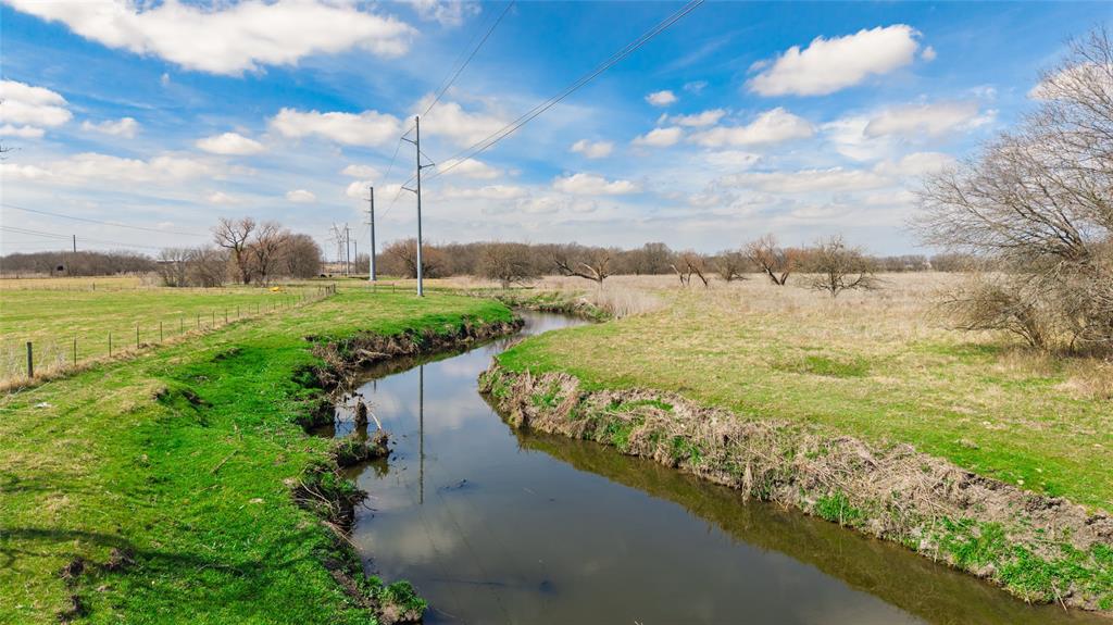 Tbd Sabine Creek Road Royse City, TX 75189 - Photo 32 of 40 a view of a lake with a big yard