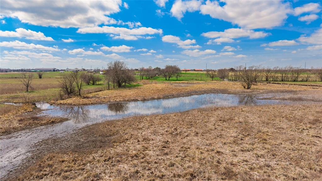 Tbd Sabine Creek Road Royse City, TX 75189 - Photo 5 of 40 a view of a lake with beach and city
