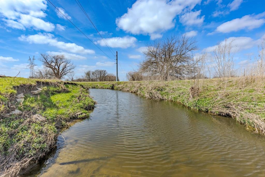 Tbd Sabine Creek Road Royse City, TX 75189 - Photo 9 of 40 a view of a water pond with outdoor space