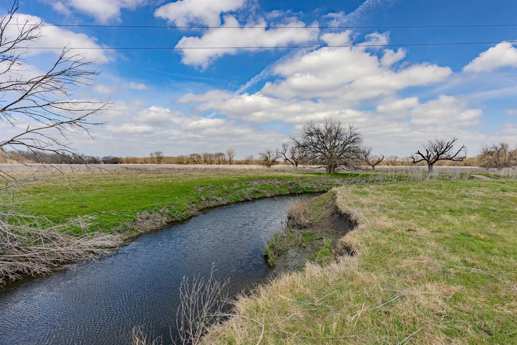 Tbd Sabine Creek Road Royse City, TX 75189 - Photo 10 of 40 a view of a lake with a big yard