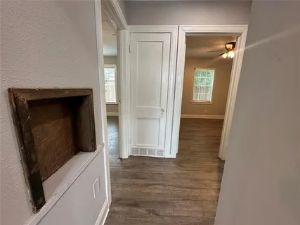 a bathroom with a sink a toilet and bathtub