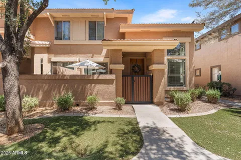 front view of a house with a yard