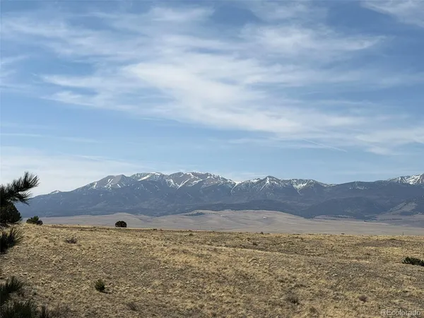 a view of ocean and mountain