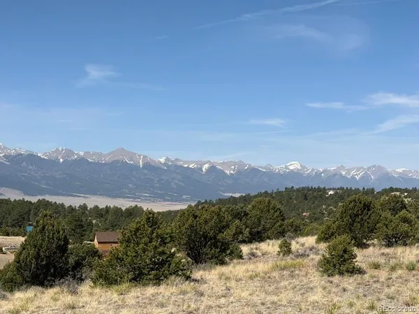 a view of a house with a mountain
