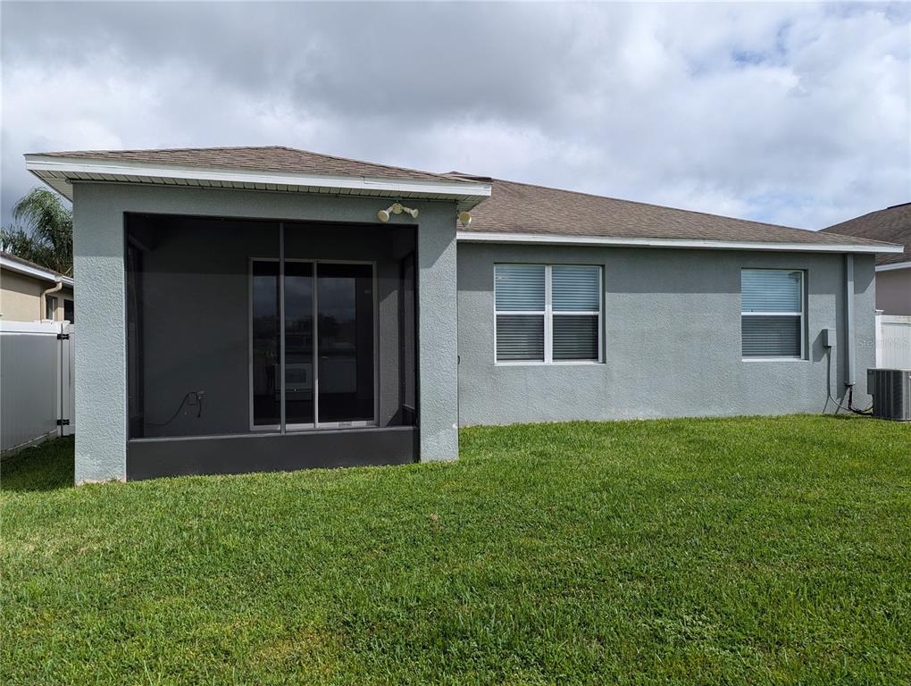13428 Graham Yarden Drive Riverview, FL 33579 - Photo 13 of 15 a view of front of a house with yard and large tree