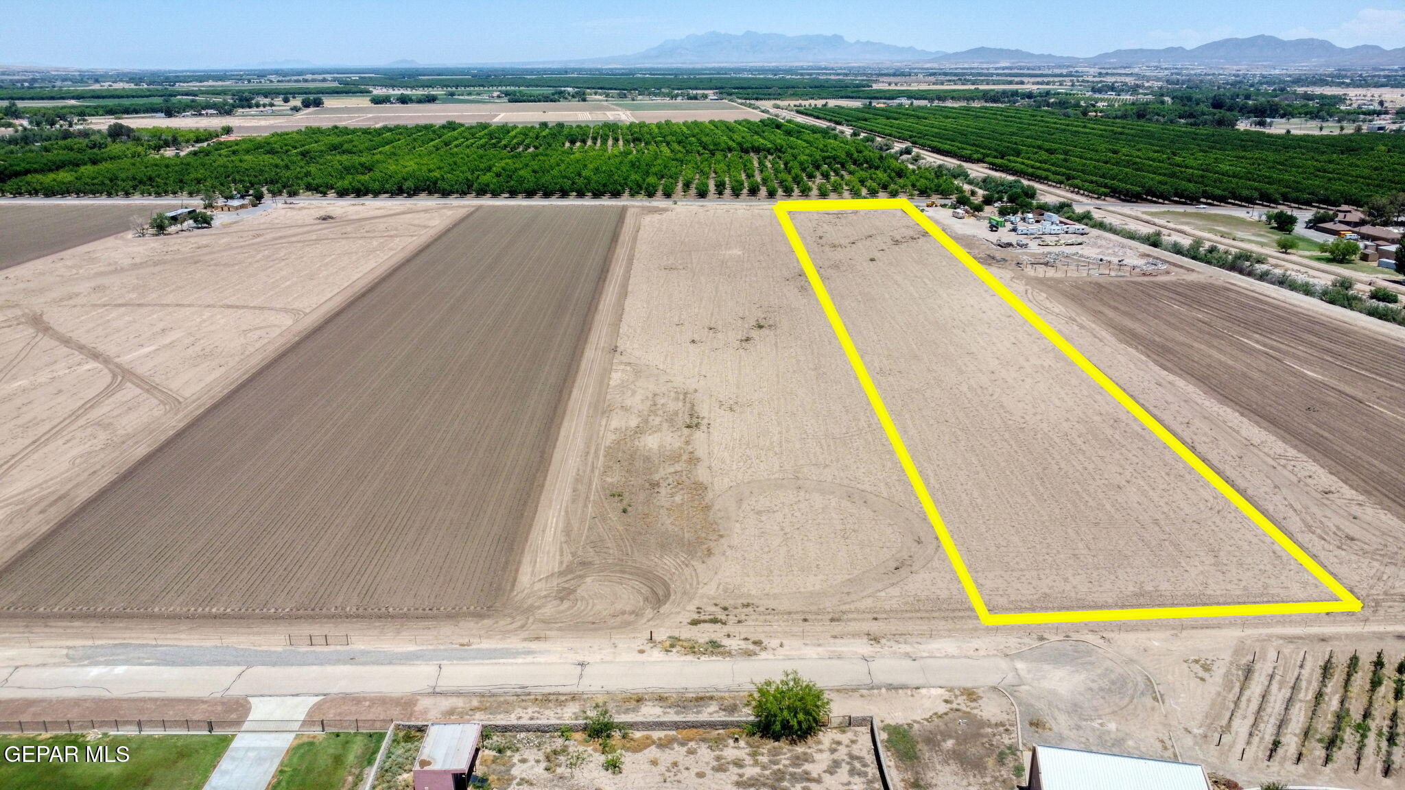 a view of swimming pool with a yard