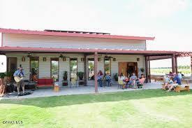 7038 McNutt Road Anthony, NM 88021 - Photo 20 of 21 a front view of the house with outdoor seating