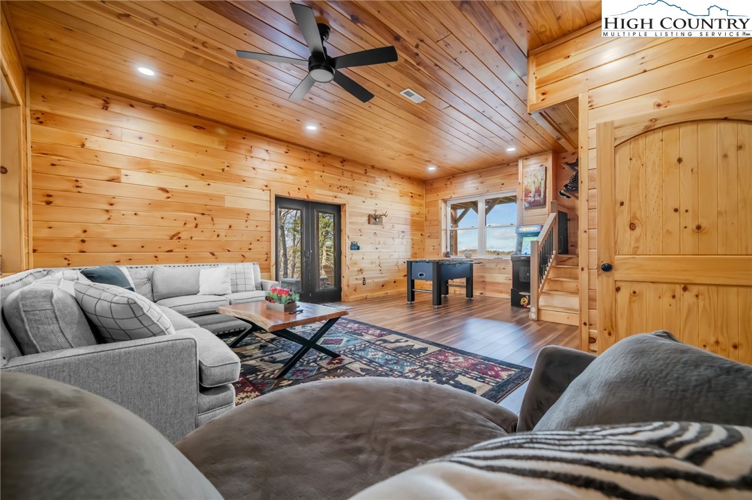 2533 Buck Mountain Road Purlear, NC 28665 - Photo 25 of 40 a living room with furniture and wooden floor