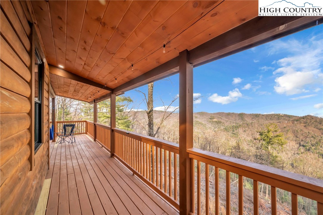 2533 Buck Mountain Road Purlear, NC 28665 - Photo 5 of 40 a view of balcony with wooden floor