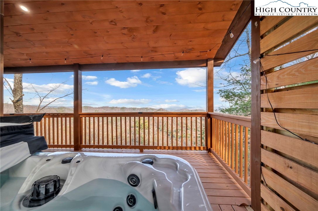 2533 Buck Mountain Road Purlear, NC 28665 - Photo 7 of 40 a view of a balcony with wooden floor