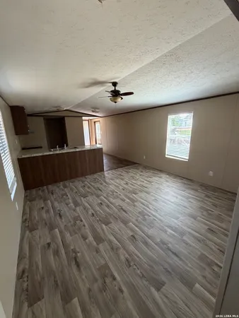 a view of a livingroom with a staircase