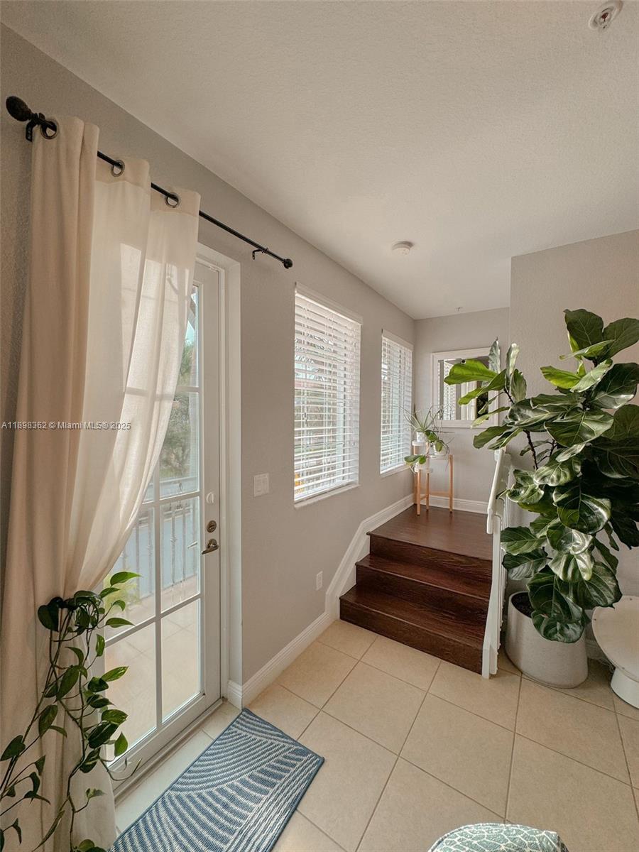 1006 Southwest 147th Avenue, Unit 10601 Pembroke Pines, FL 33027 - Photo 17 of 38 a living room with furniture