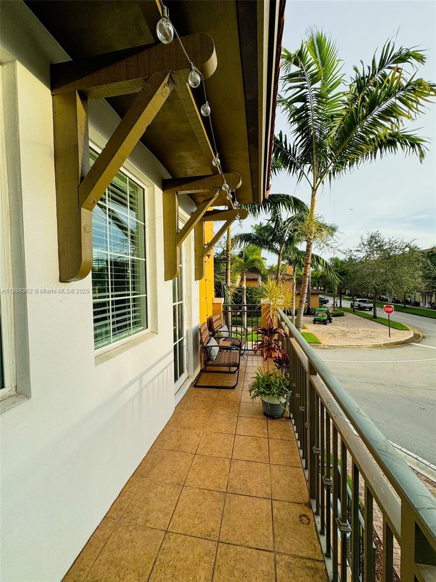 1006 Southwest 147th Avenue, Unit 10601 Pembroke Pines, FL 33027 - Photo 19 of 38 a view of steet with deck