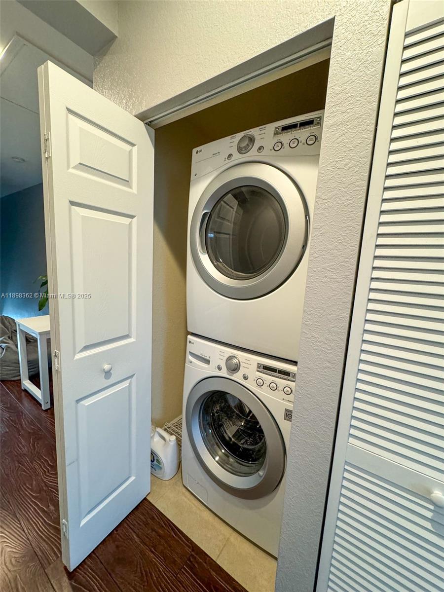 1006 Southwest 147th Avenue, Unit 10601 Pembroke Pines, FL 33027 - Photo 20 of 38 a utility room with dryer and washer