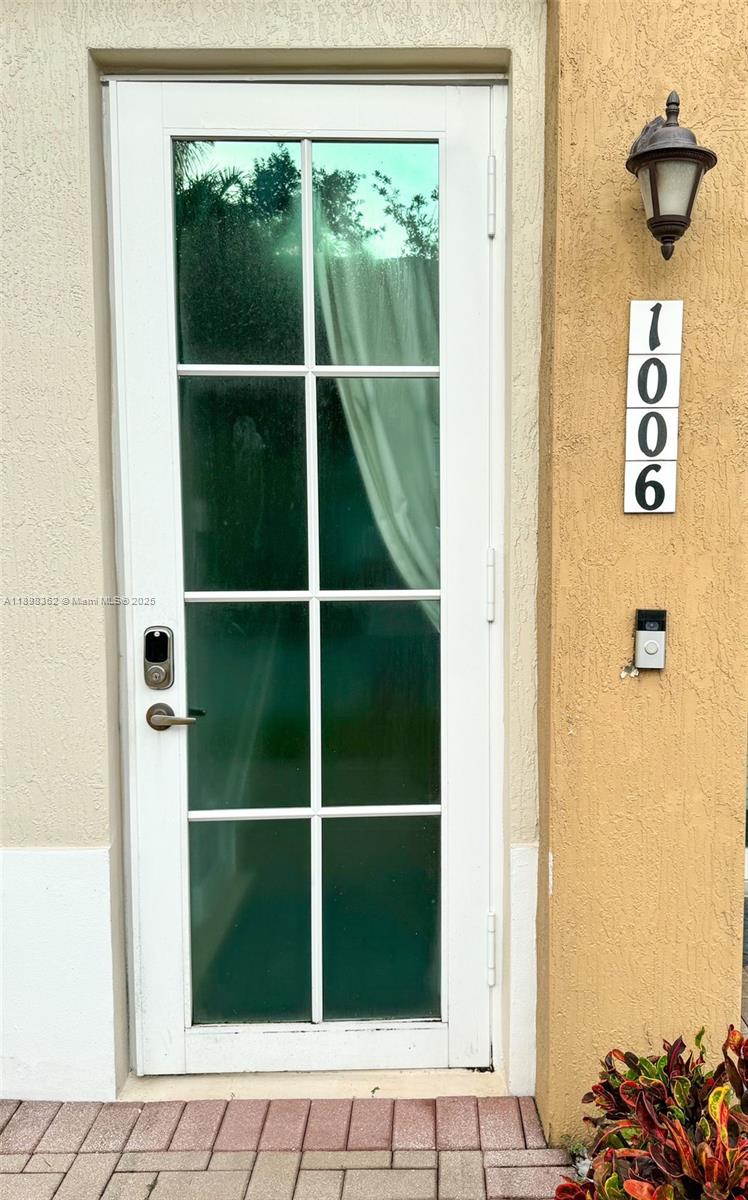 1006 Southwest 147th Avenue, Unit 10601 Pembroke Pines, FL 33027 - Photo 3 of 38 a view of front door