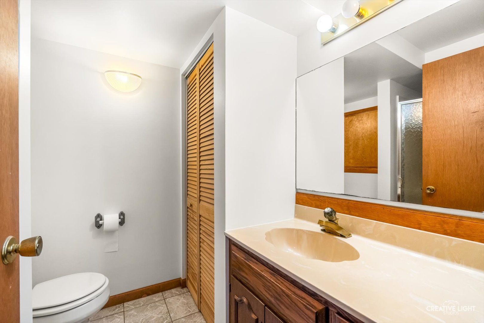 1483 Nova Road Sandwich, IL 60548 - Photo 19 of 29 a bathroom with a granite countertop sink toilet and mirror
