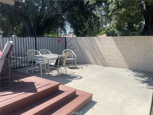 a view of a outdoor sitting area with furniture