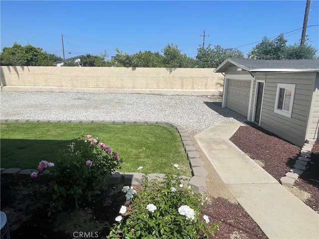 a view of a lake with a house in the background