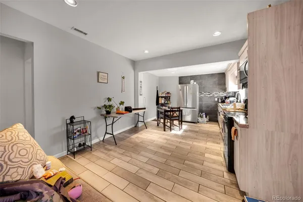 a view of a livingroom with furniture and a livingroom