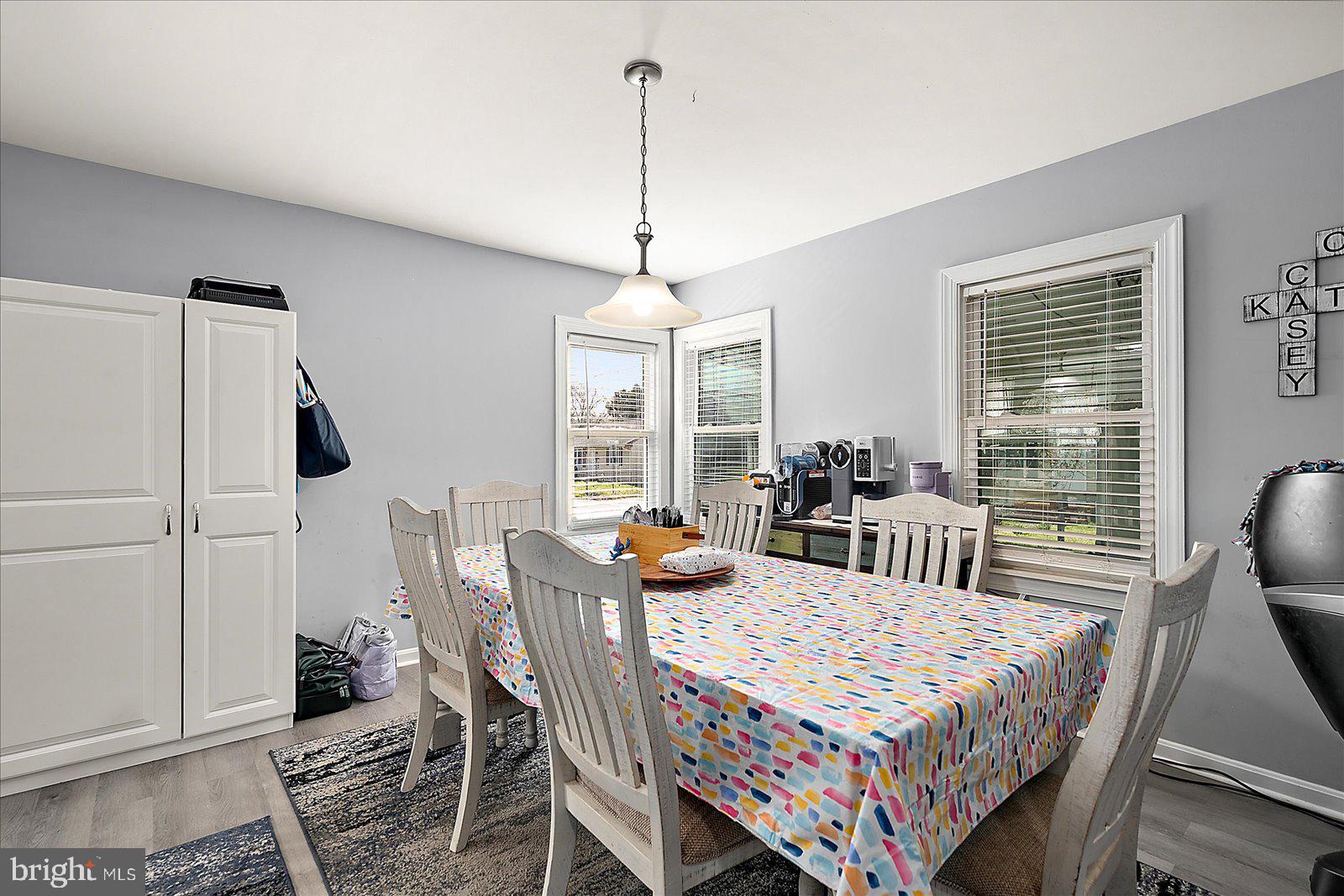411 East Walnut Street Hebron, MD 21830 - Photo 16 of 54 a dining room with furniture and window