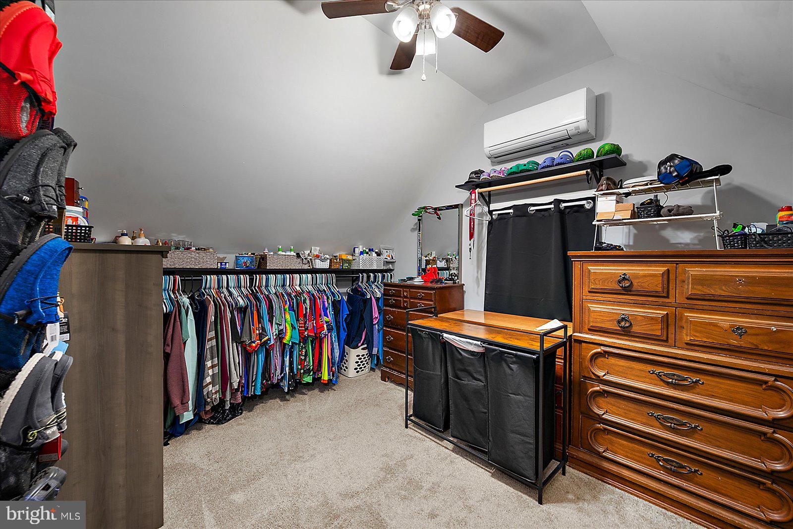 411 East Walnut Street Hebron, MD 21830 - Photo 24 of 54 a view of a storage room with an entryway and furniture