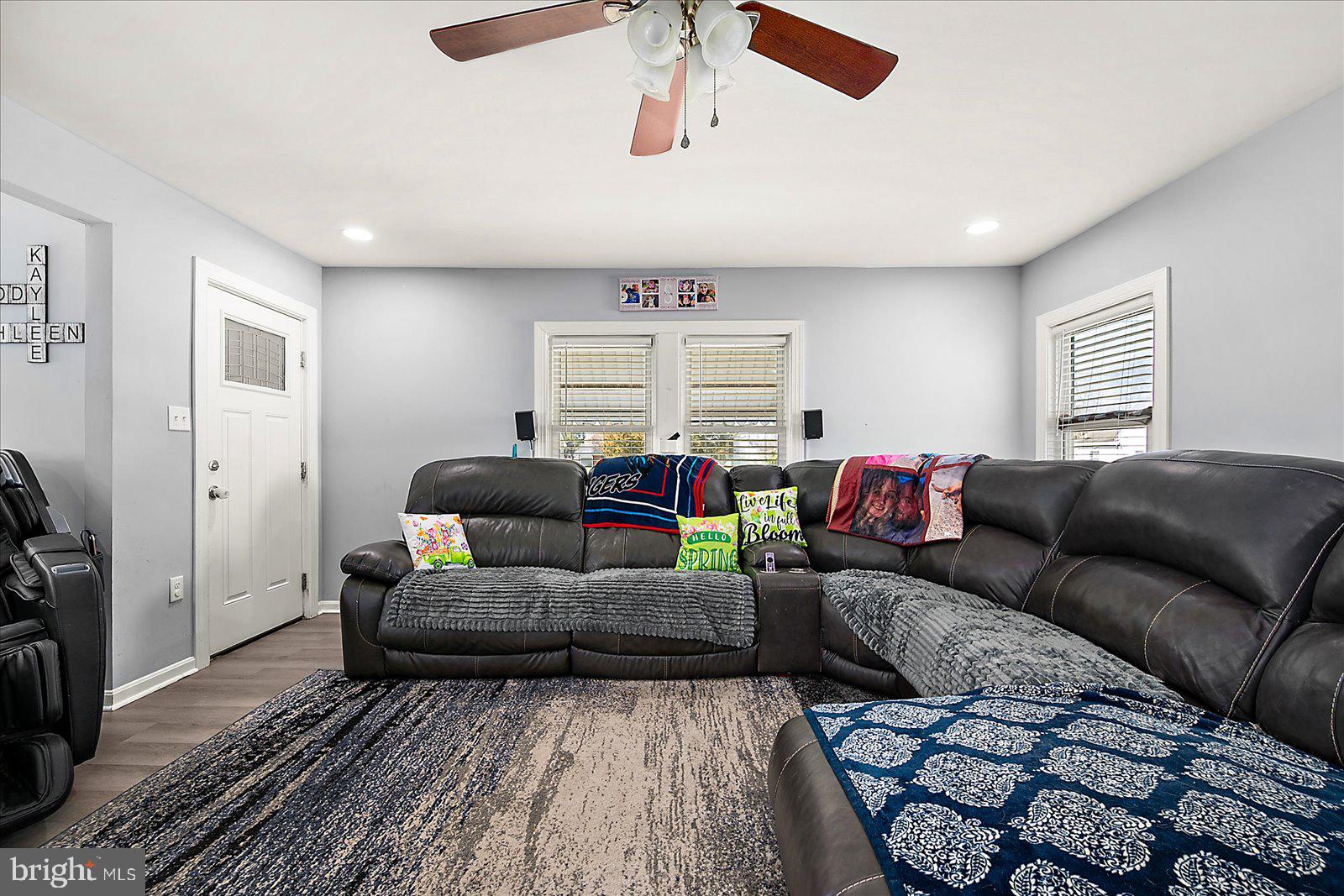 411 East Walnut Street Hebron, MD 21830 - Photo 7 of 54 a living room with furniture and a window