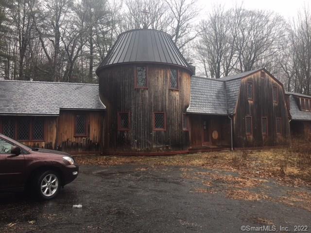 3310 Durham Road Guilford, CT 06437 - Photo 1 of 1 a front view of a house with a yard