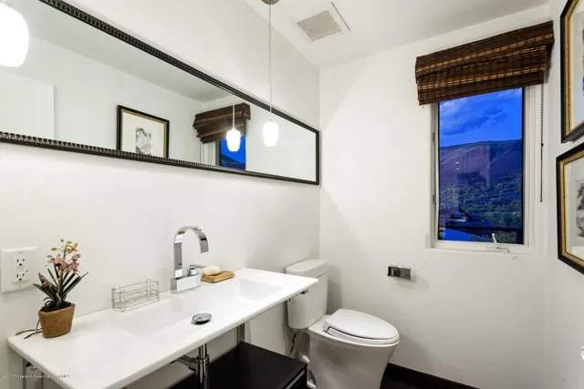 a bathroom with a sink and a toilet