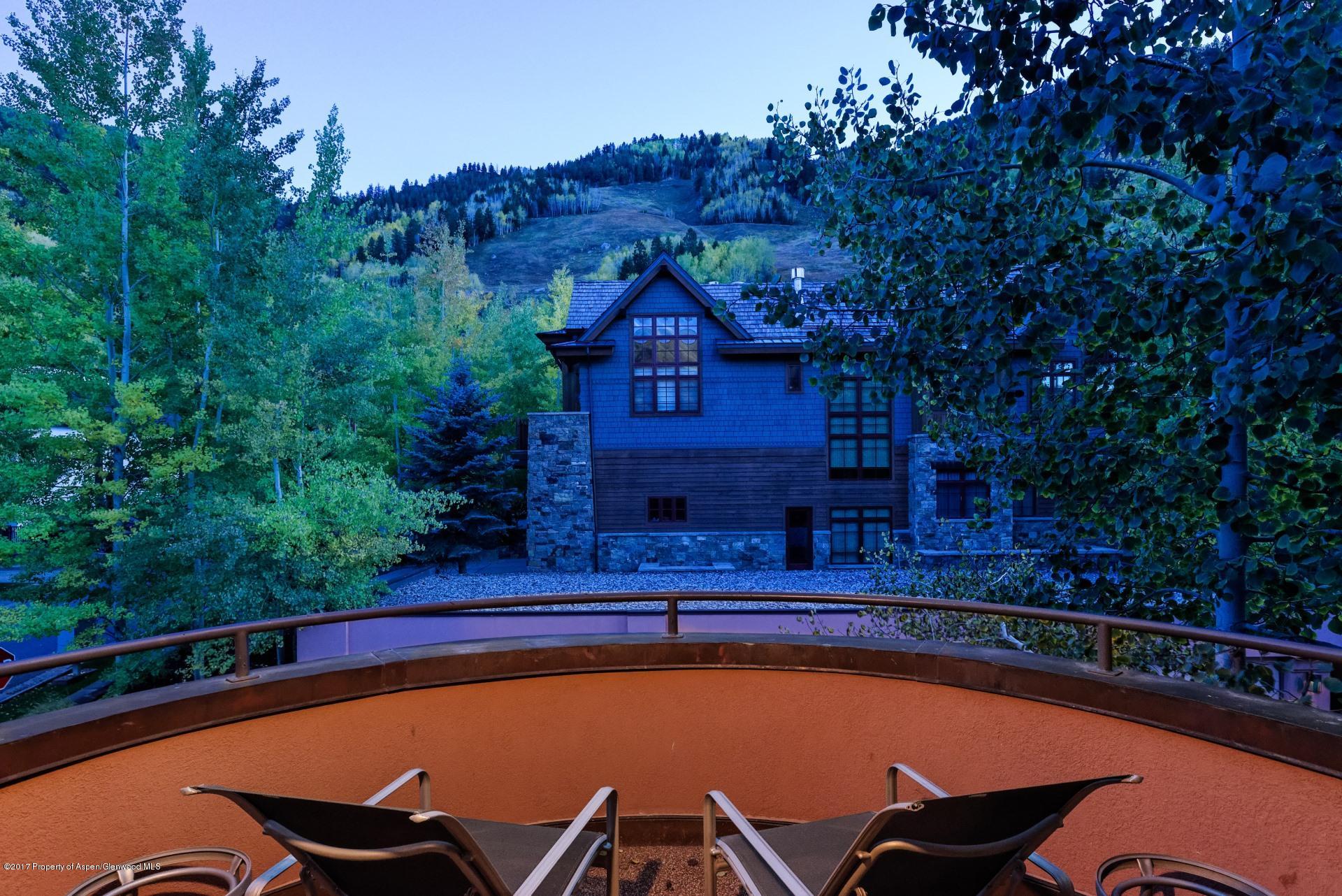 342 Summit Street, Unit B Aspen, CO 81611 - Photo 29 of 31 a view of a pool with a balcony