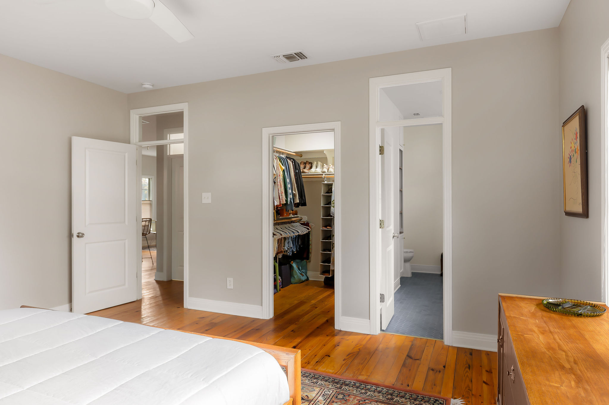 5108 Eilers Avenue Austin, TX 78751 - Photo 33 of 39 Primary bedroom with view of walk-in closet and primary bathroom