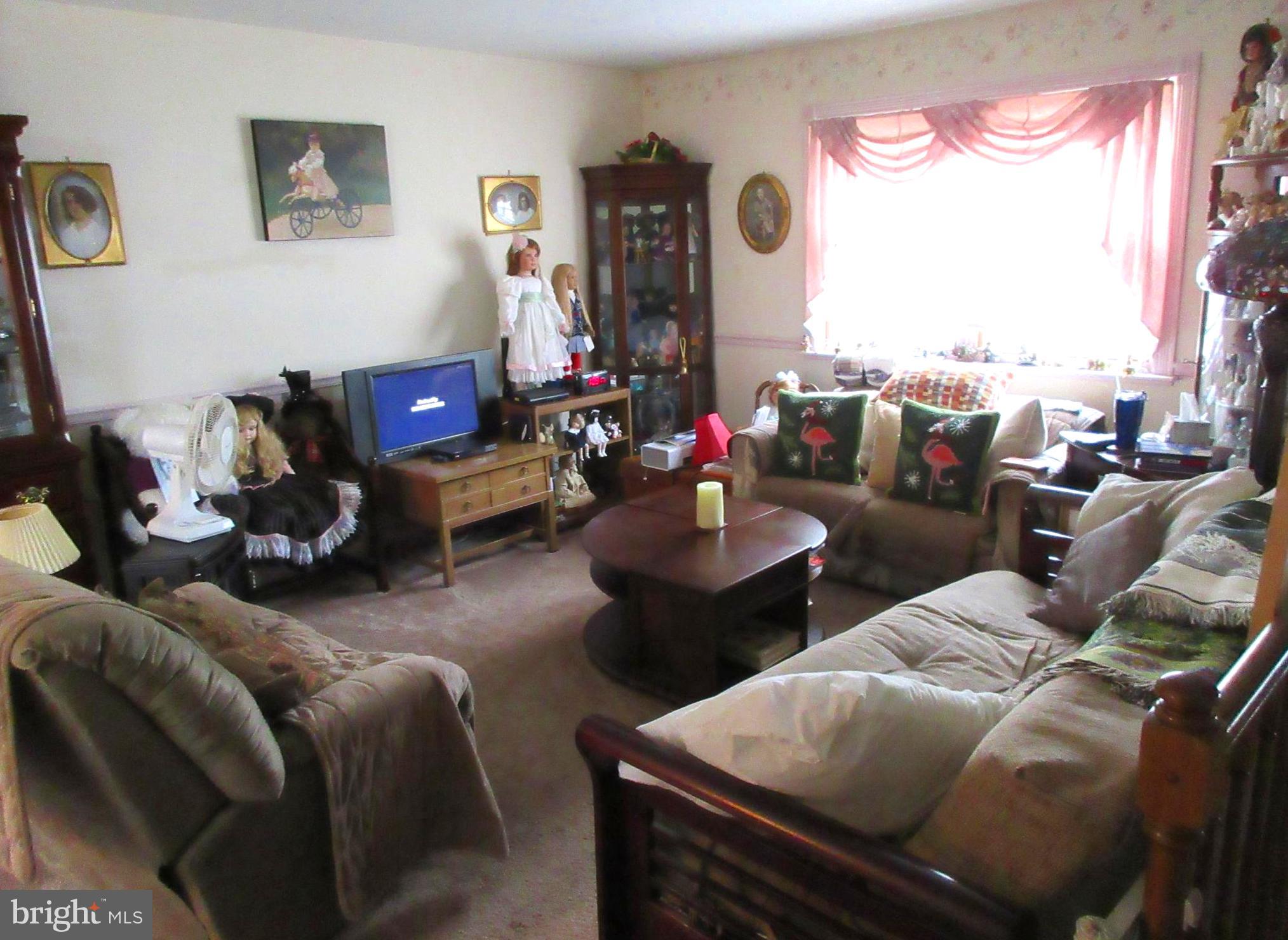 1202 Purnell Road Severna Park, MD 21146 - Photo 2 of 24 Living room. Please forgive our clutter
