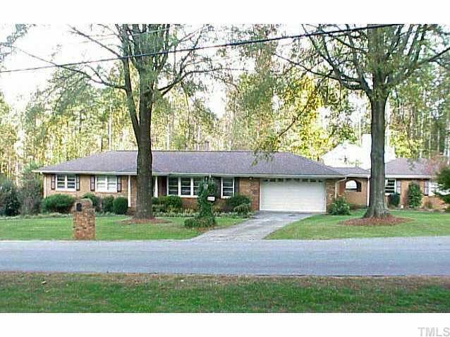 6300 Brandywine Road Raleigh, NC 27607 - Photo 1 of 1 a front view of a house with a yard and garage