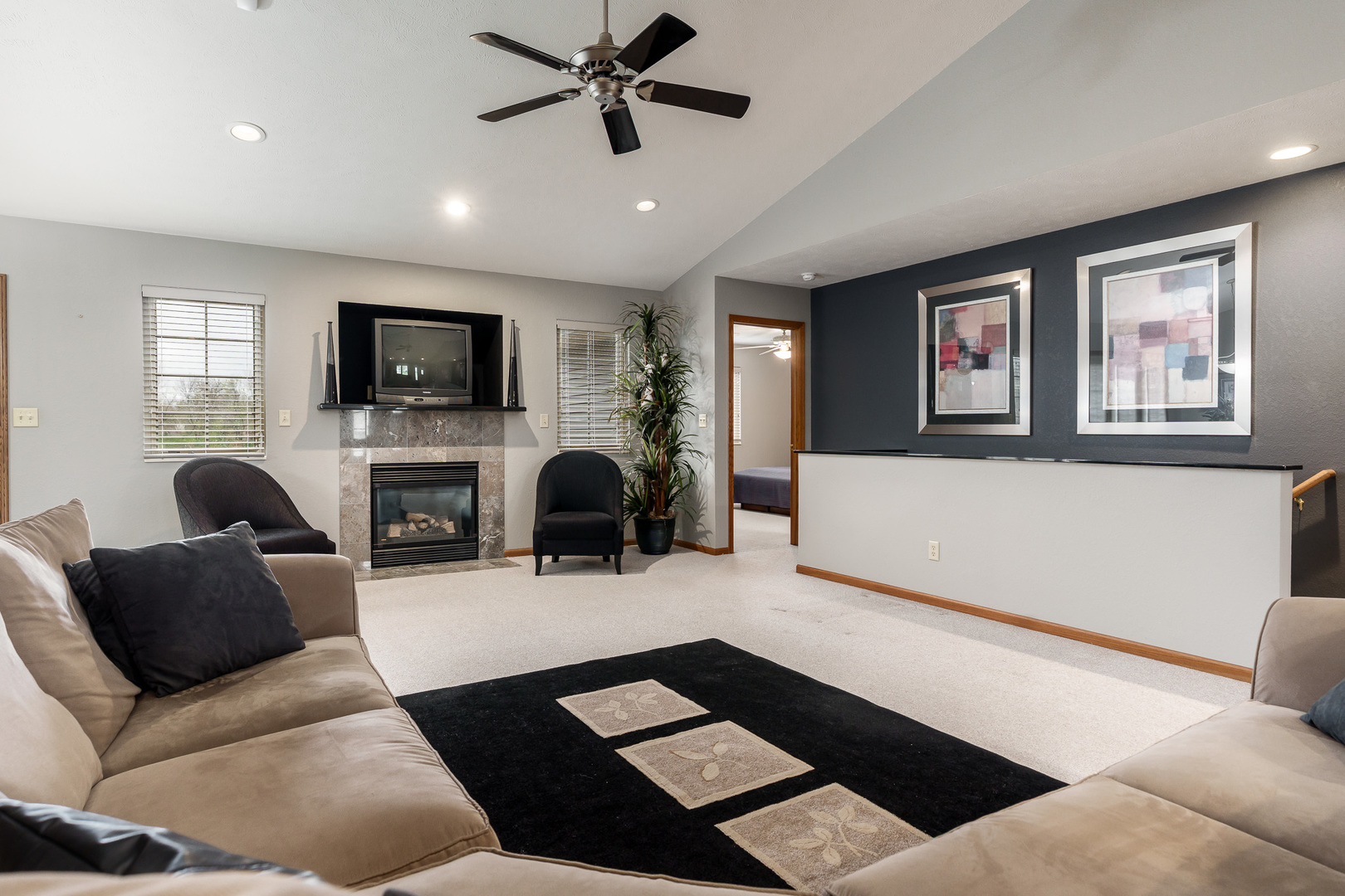 6465 Corina's Curve Rockford, IL 61103 - Photo 11 of 48 a living room with furniture and a flat screen tv