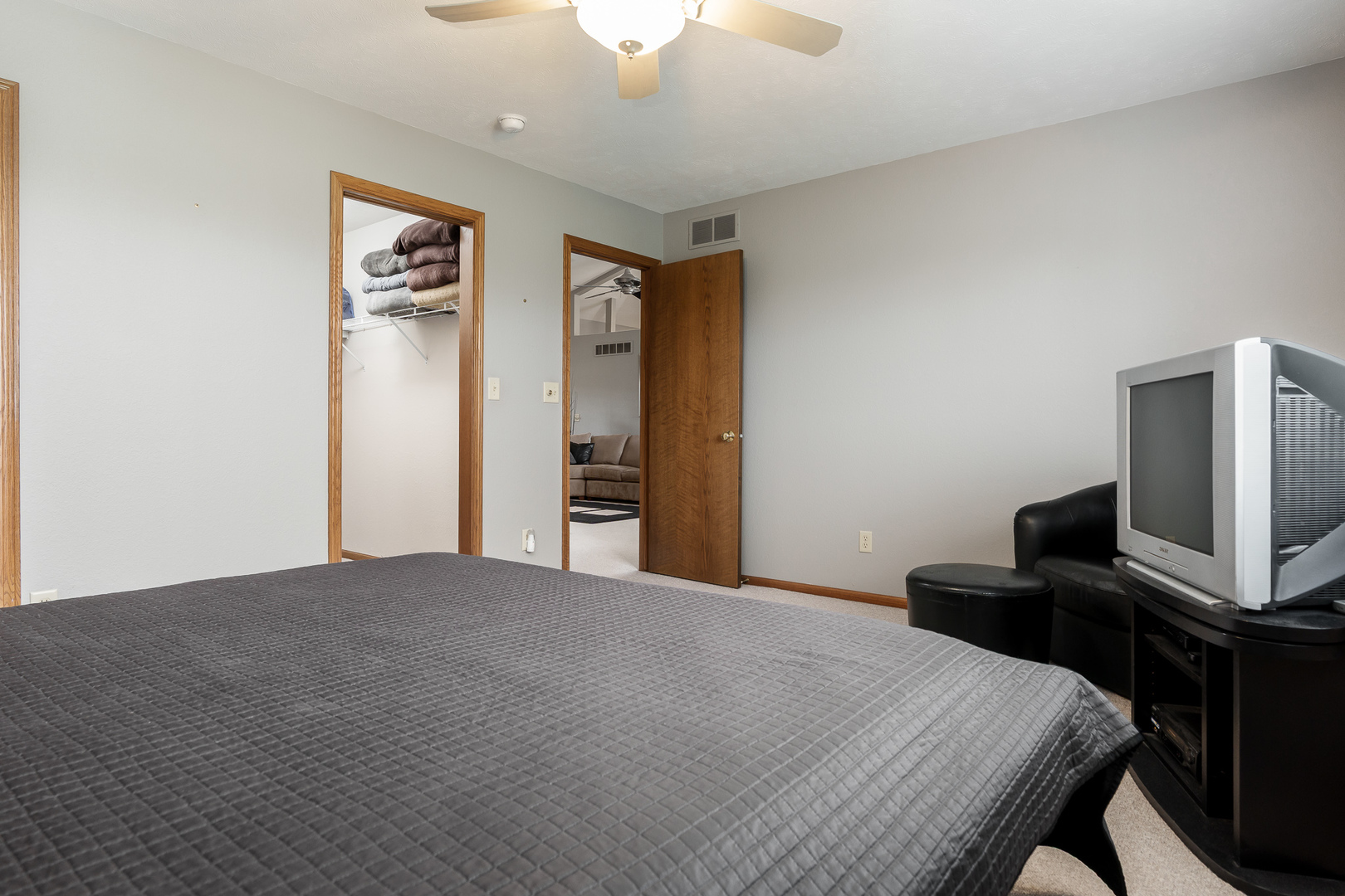 6465 Corina's Curve Rockford, IL 61103 - Photo 26 of 48 a bedroom with a bed and a flat screen tv