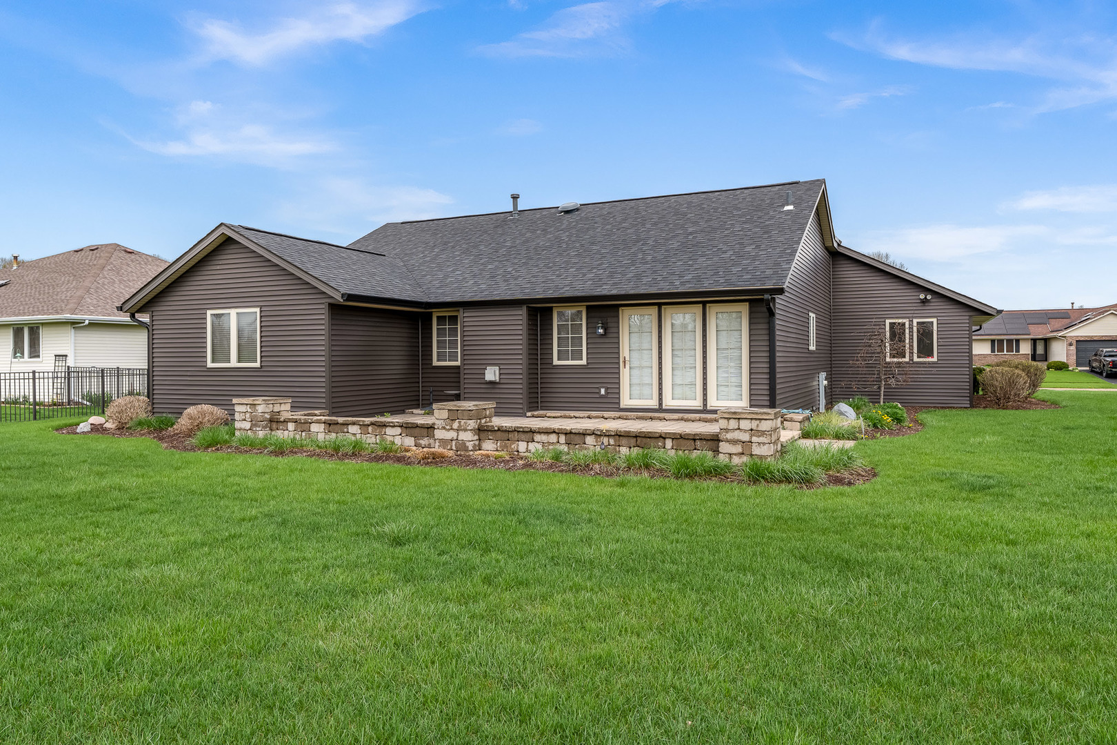 6465 Corina's Curve Rockford, IL 61103 - Photo 40 of 48 a front view of house with yard barbeque and outdoor seating