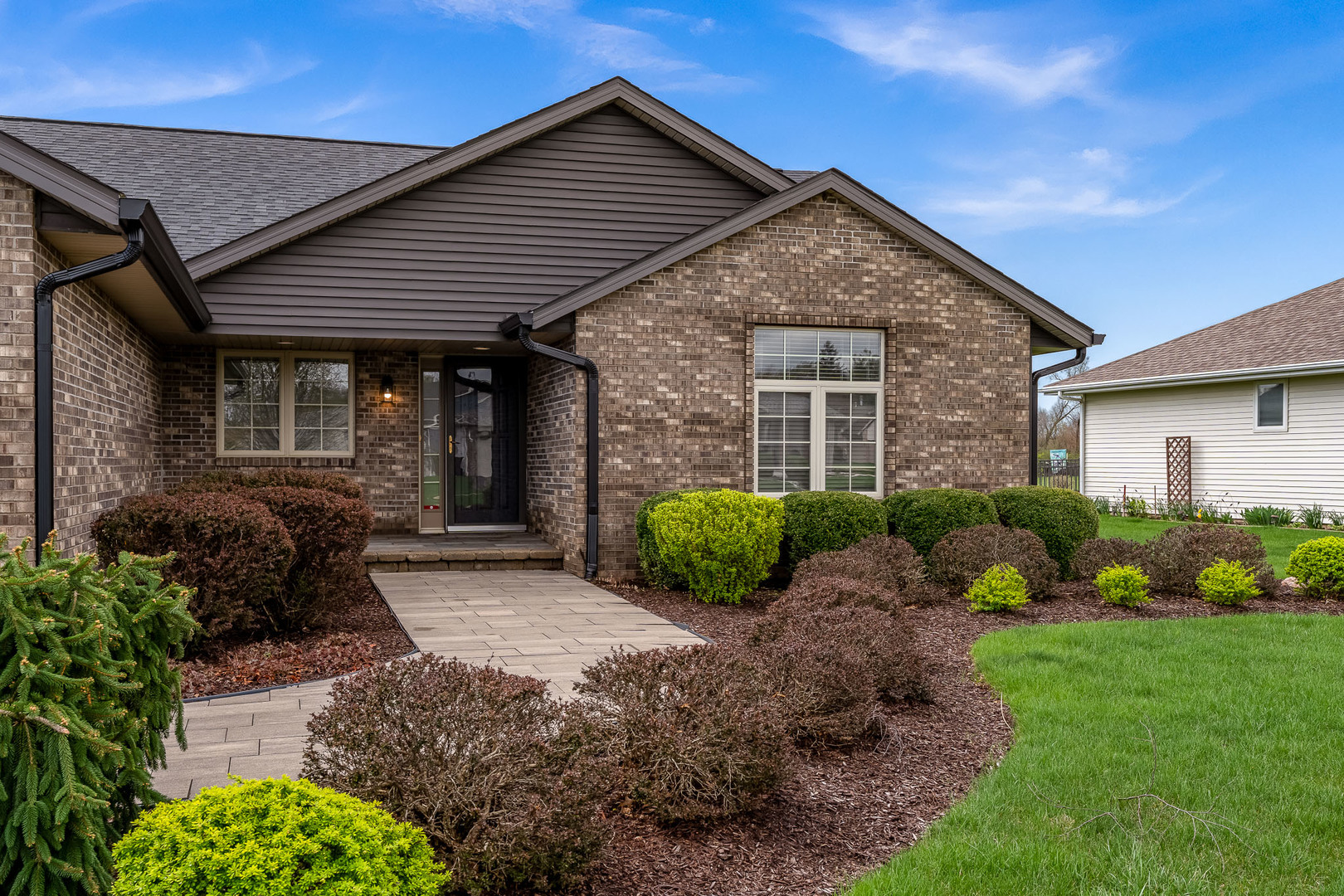 6465 Corina's Curve Rockford, IL 61103 - Photo 4 of 48 a view of a house with a yard