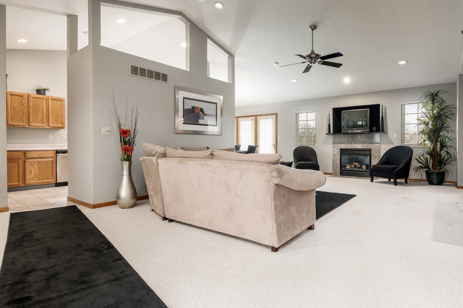 6465 Corina's Curve Rockford, IL 61103 - Photo 8 of 48 a living room with furniture and a flat screen tv