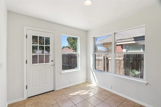 a view of an empty room with window