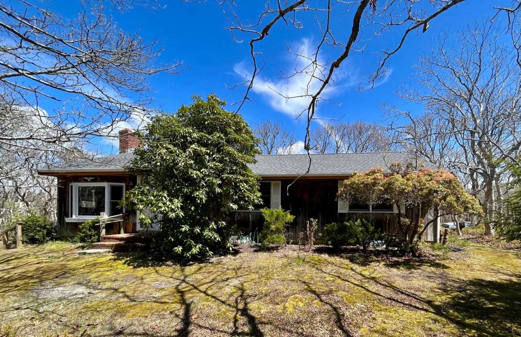 42 Marthas Road Edgartown, MA 02539 - Photo 1 of 18 a view of a house with a yard