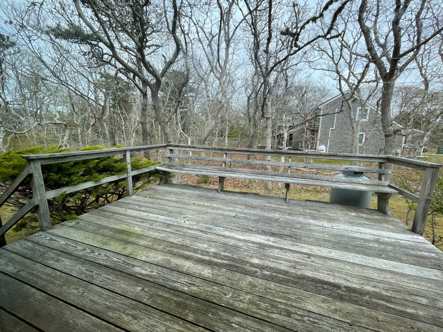 42 Marthas Road Edgartown, MA 02539 - Photo 3 of 18 a view of a swimming pool with trees in the background