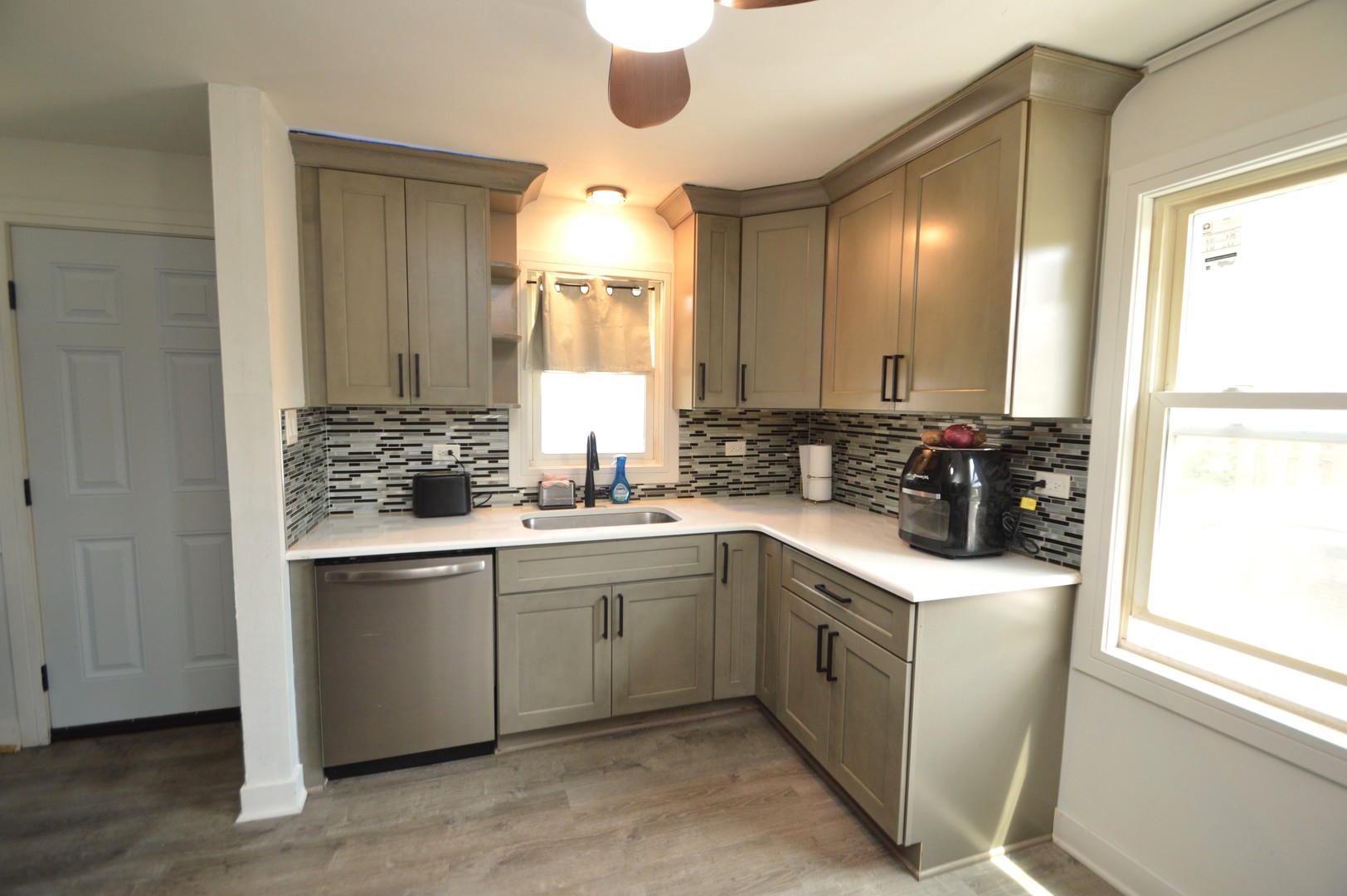 1509 Morris Avenue Berkeley, IL 60163 - Photo 10 of 28 a kitchen with a sink cabinets and window