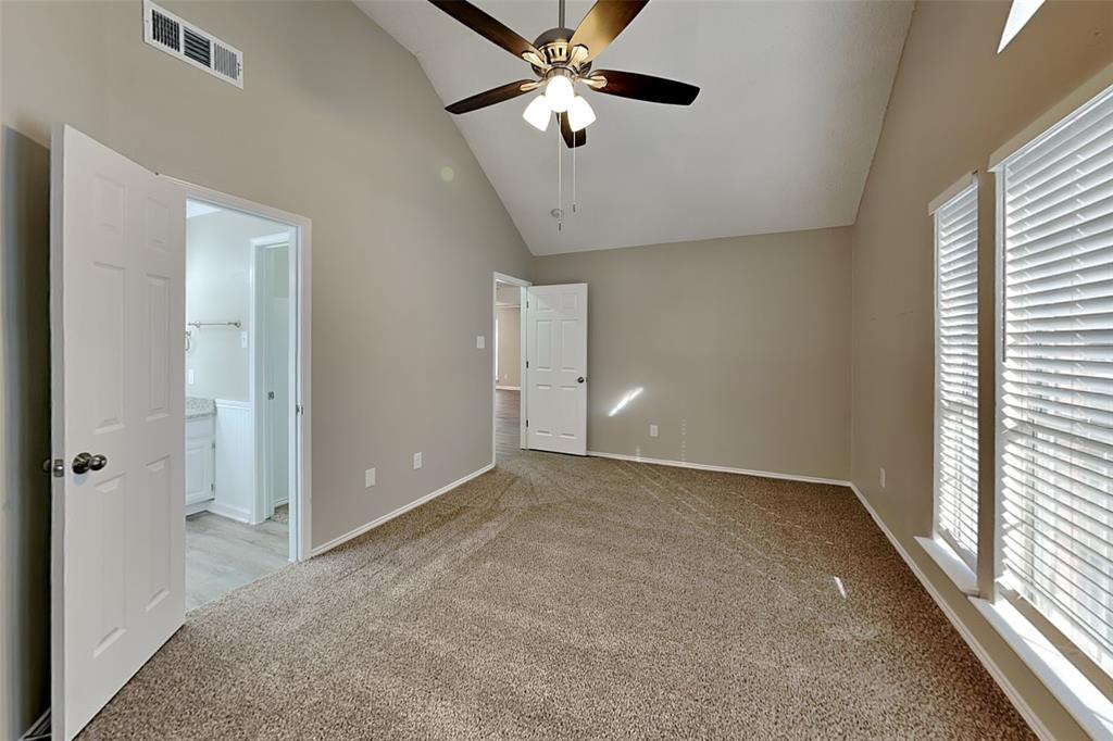 7309 Indiana Avenue Fort Worth, TX 76137 - Photo 8 of 18 Unfurnished bedroom featuring high vaulted ceiling, light colored carpet, and ceiling fan